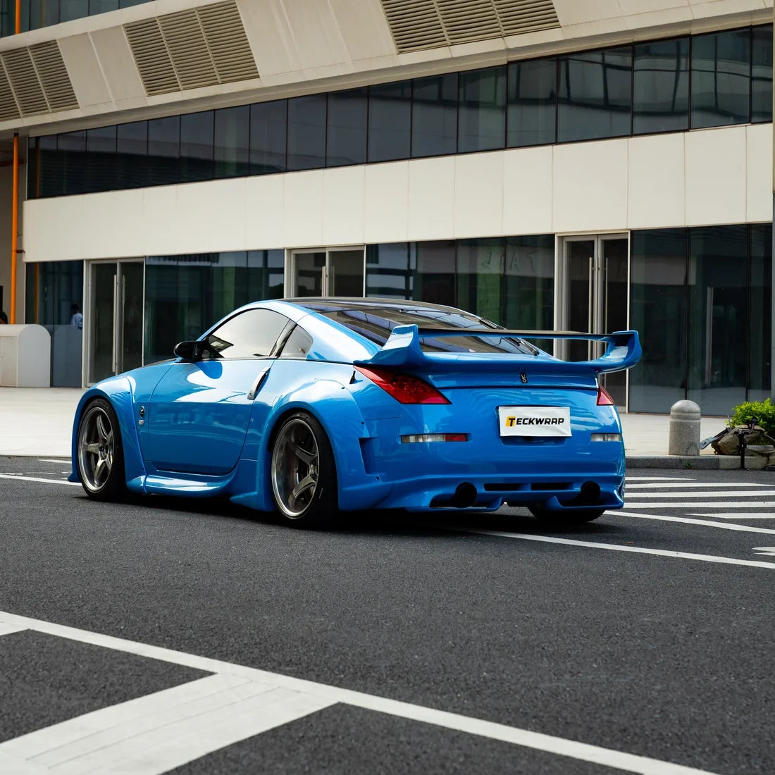 Nissan showcasing High Gloss Vibrant Blue Vinyl Wrap.