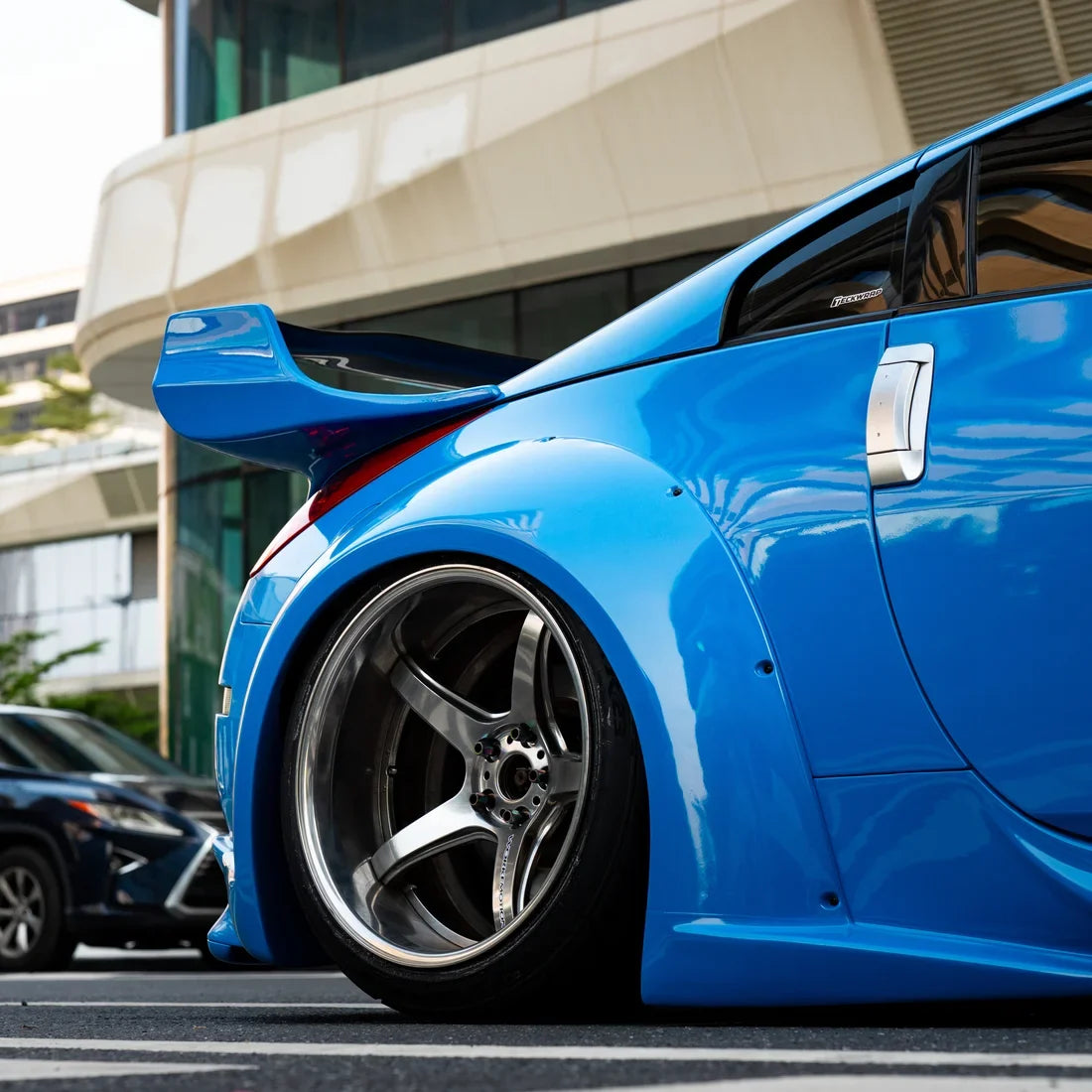 High Gloss Vibrant Blue Vinyl Wrap Nissan Side View