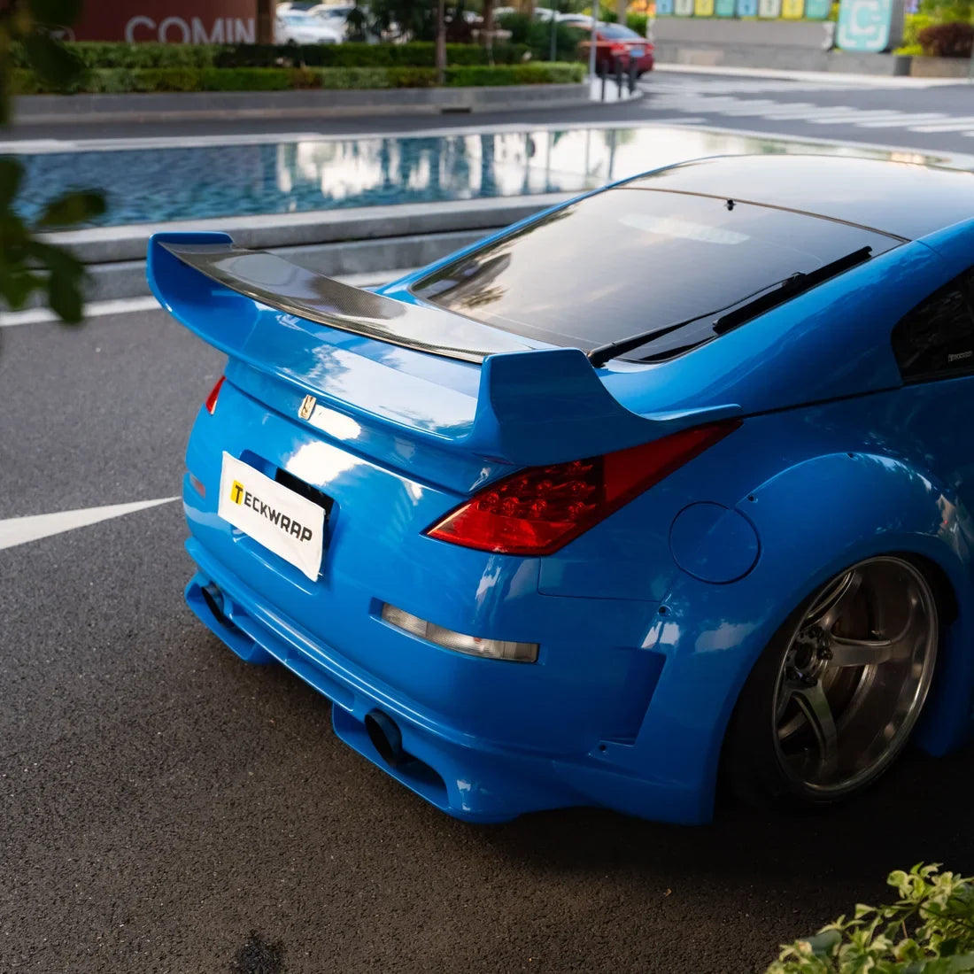 High Gloss Vibrant Blue Vinyl Wrap Nissan.