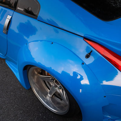 Nissan showcasing a High Gloss Vibrant Blue Vinyl Wrap.