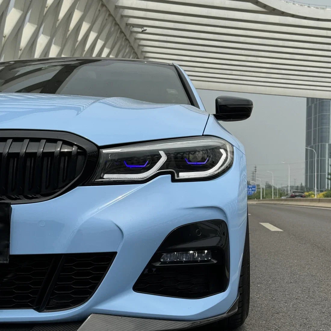 BMW showcasing High Gloss Baby Blue Vinyl Wrap headlight