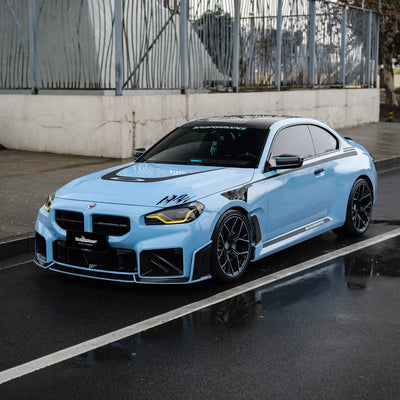 BMW showcasing a High Gloss Baby Blue Vinyl Wrap finish.