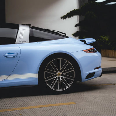 High Gloss Baby Blue Vinyl Wrap on Porsche wheel