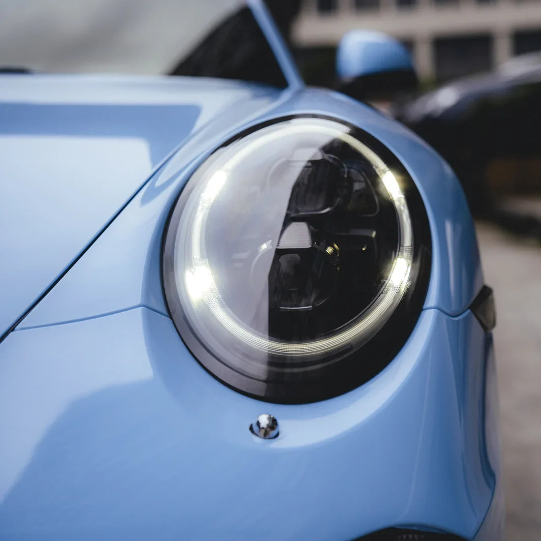 High Gloss Baby Blue Vinyl Wrap on Porsche headlight