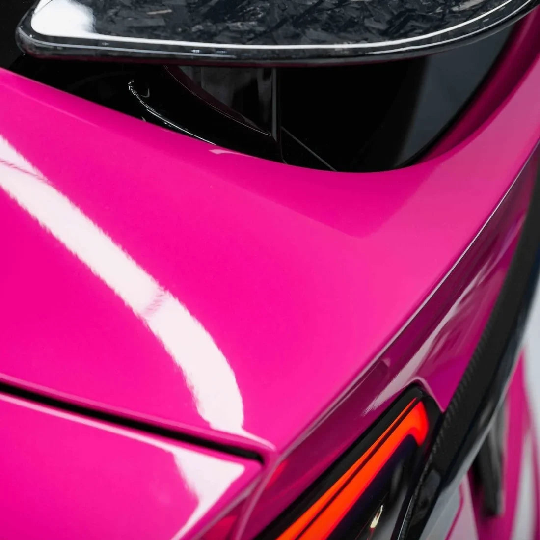 Tesla showcasing High Gloss Sorbet Pink Vinyl Wrap.