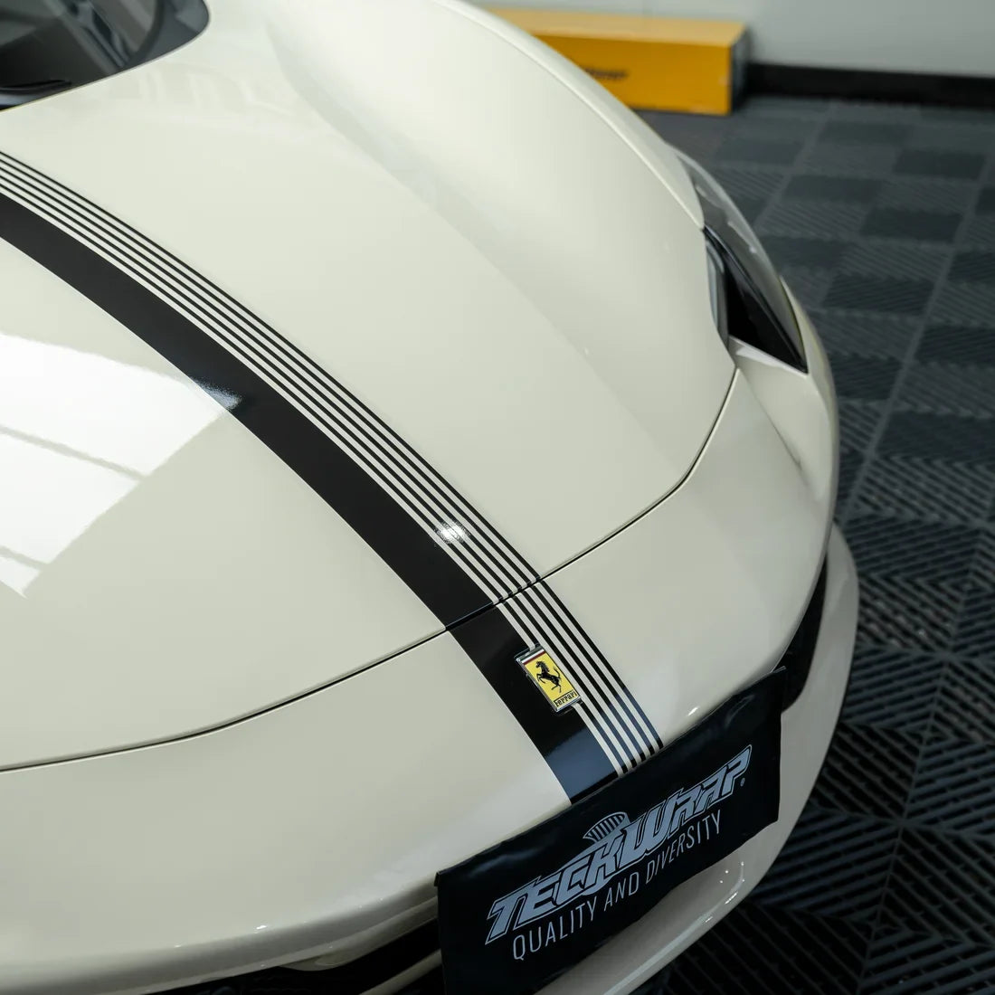 Ferrari in High Gloss Vanilla Mist Vinyl Wrap.