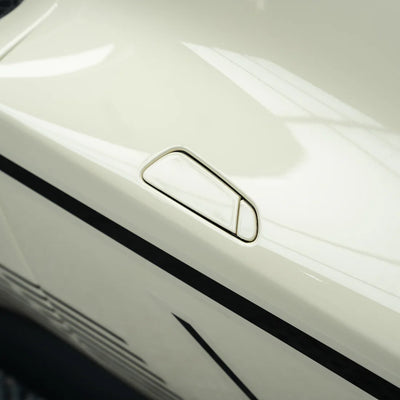 Ferrari showcasing a High Gloss Vanilla Mist Vinyl Wrap finish.