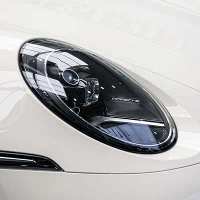 Porsche featuring a High Gloss Vanilla Mist Vinyl Wrap.