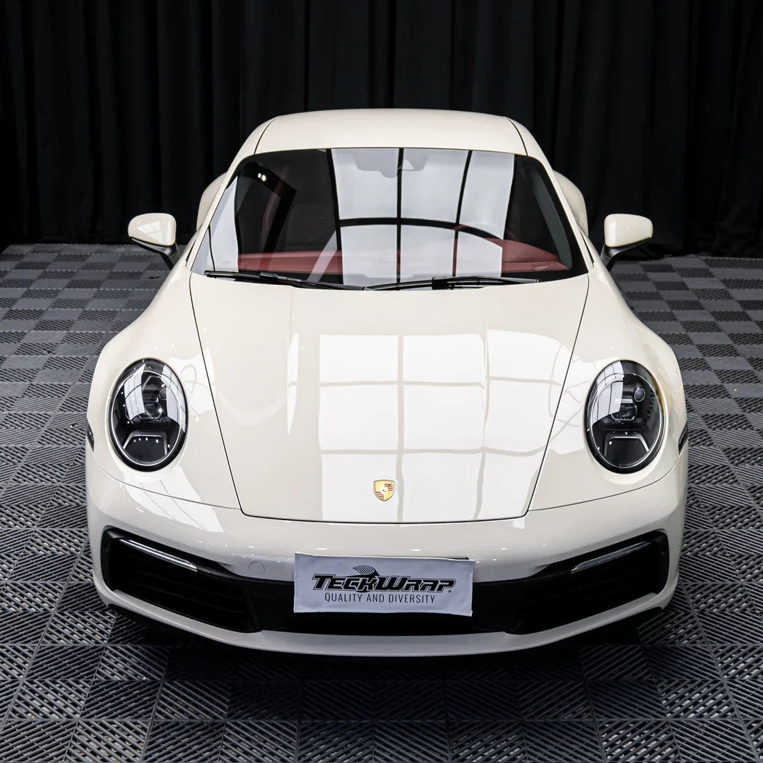 Porsche with a High Gloss Vanilla Mist Vinyl Wrap finish.