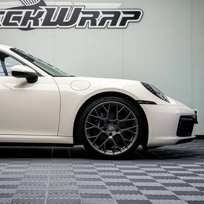 Porsche with a High Gloss Vanilla Mist Vinyl Wrap finish.