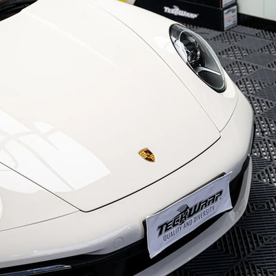 Porsche wrapped in Vanilla Mist high gloss vinyl.