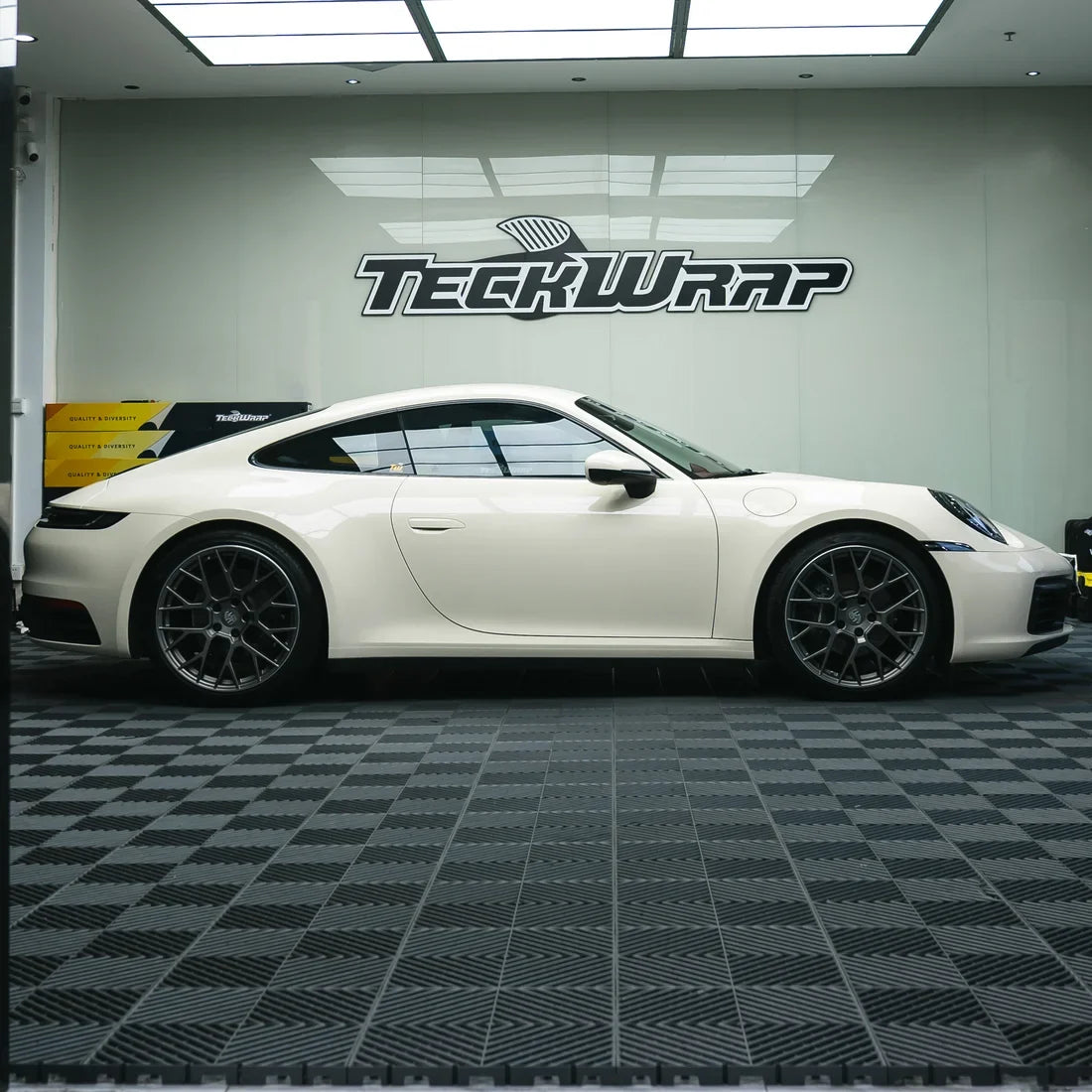 Porsche with a High Gloss Vanilla Mist Vinyl Wrap finish.