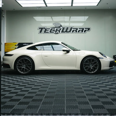 Porsche with a High Gloss Vanilla Mist Vinyl Wrap finish.