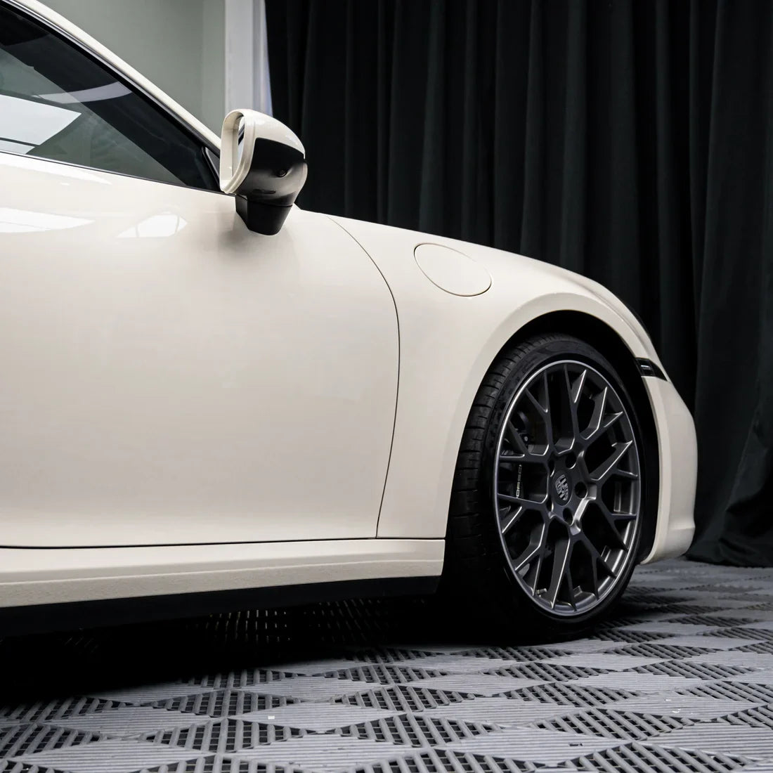 Porsche sporting a High Gloss Vanilla Mist Vinyl Wrap.
