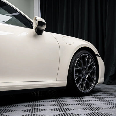 Porsche sporting a High Gloss Vanilla Mist Vinyl Wrap.