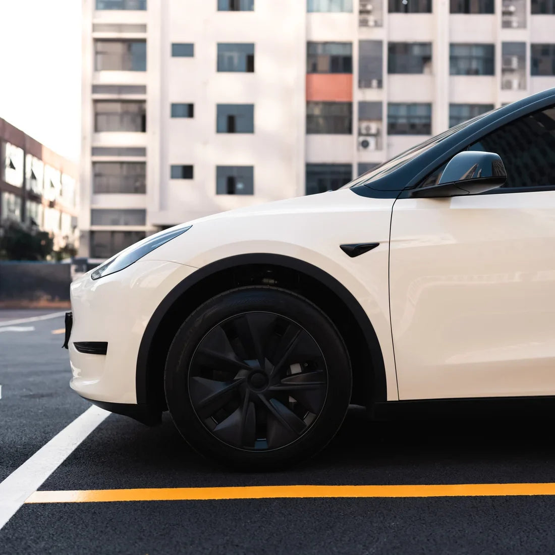 Tesla wrapped inHigh Gloss Vanilla Mist Vinyl Wrap