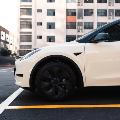 Tesla wrapped inHigh Gloss Vanilla Mist Vinyl Wrap