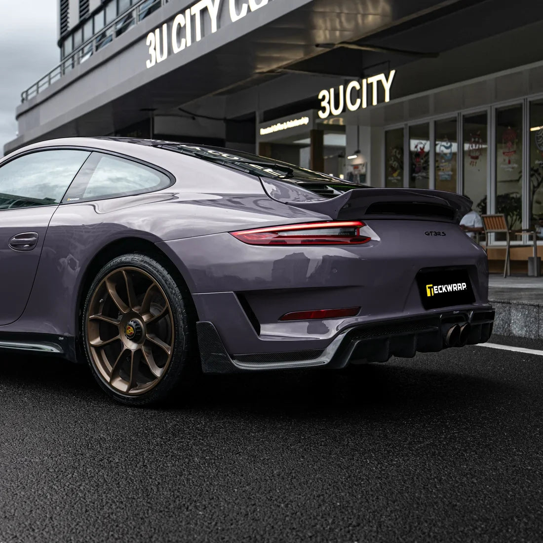 Porsche featuring a High Gloss Dusky Grape Vinyl Wrap