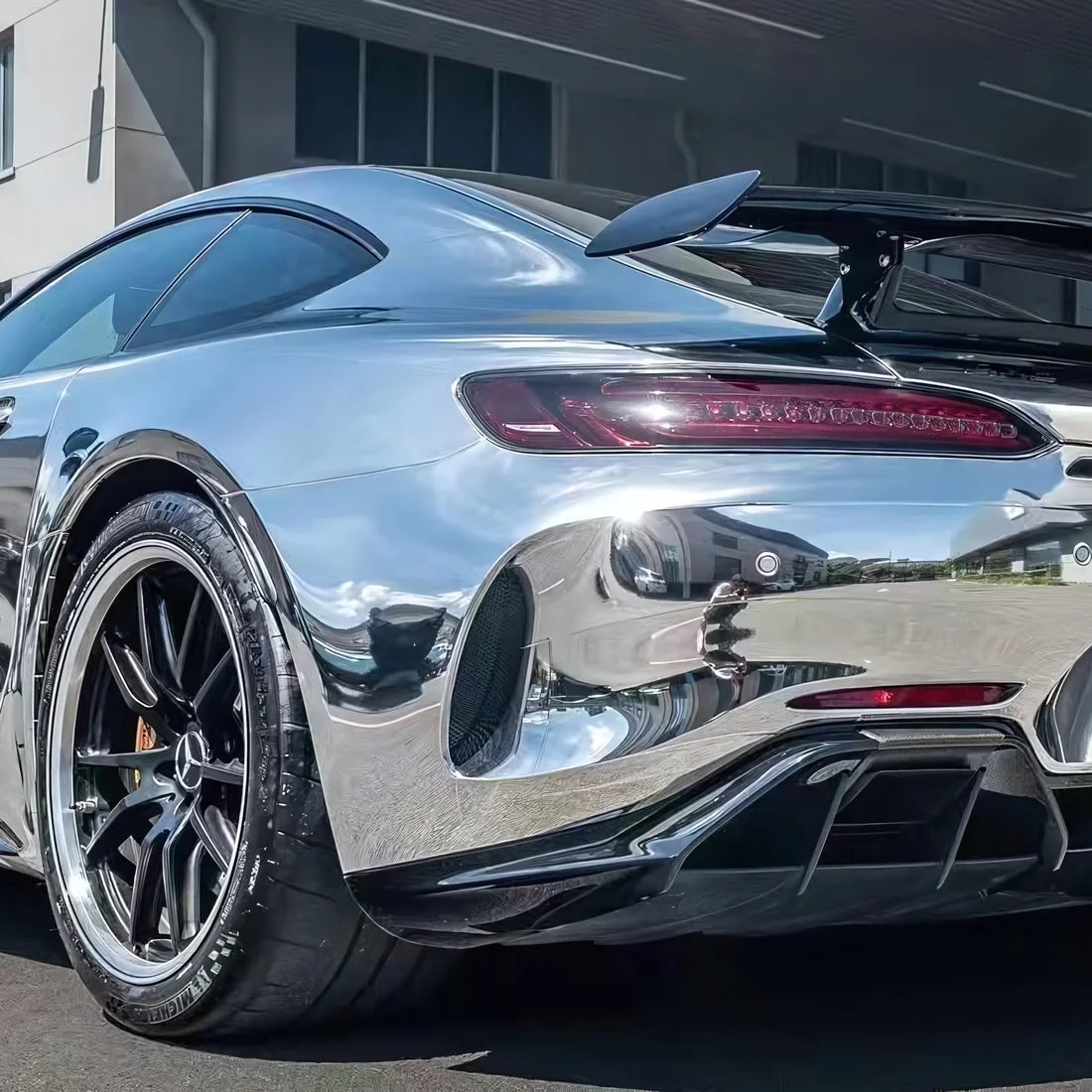 White Gold Mirror Chrome AMG with a clean reflective body.