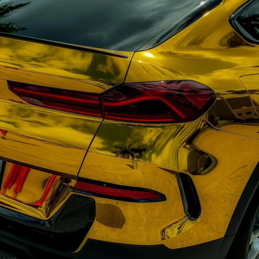 Yellow Gold Mirror Chrome vinyl wrap on BMW.