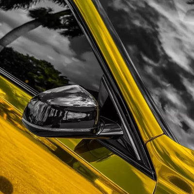 BMW a lustrous Yellow Gold Mirror Chrome vinyl wrap.