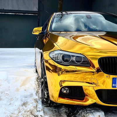 Yellow Gold Mirror Chrome vinyl wrap on BMW with a radiant golden.