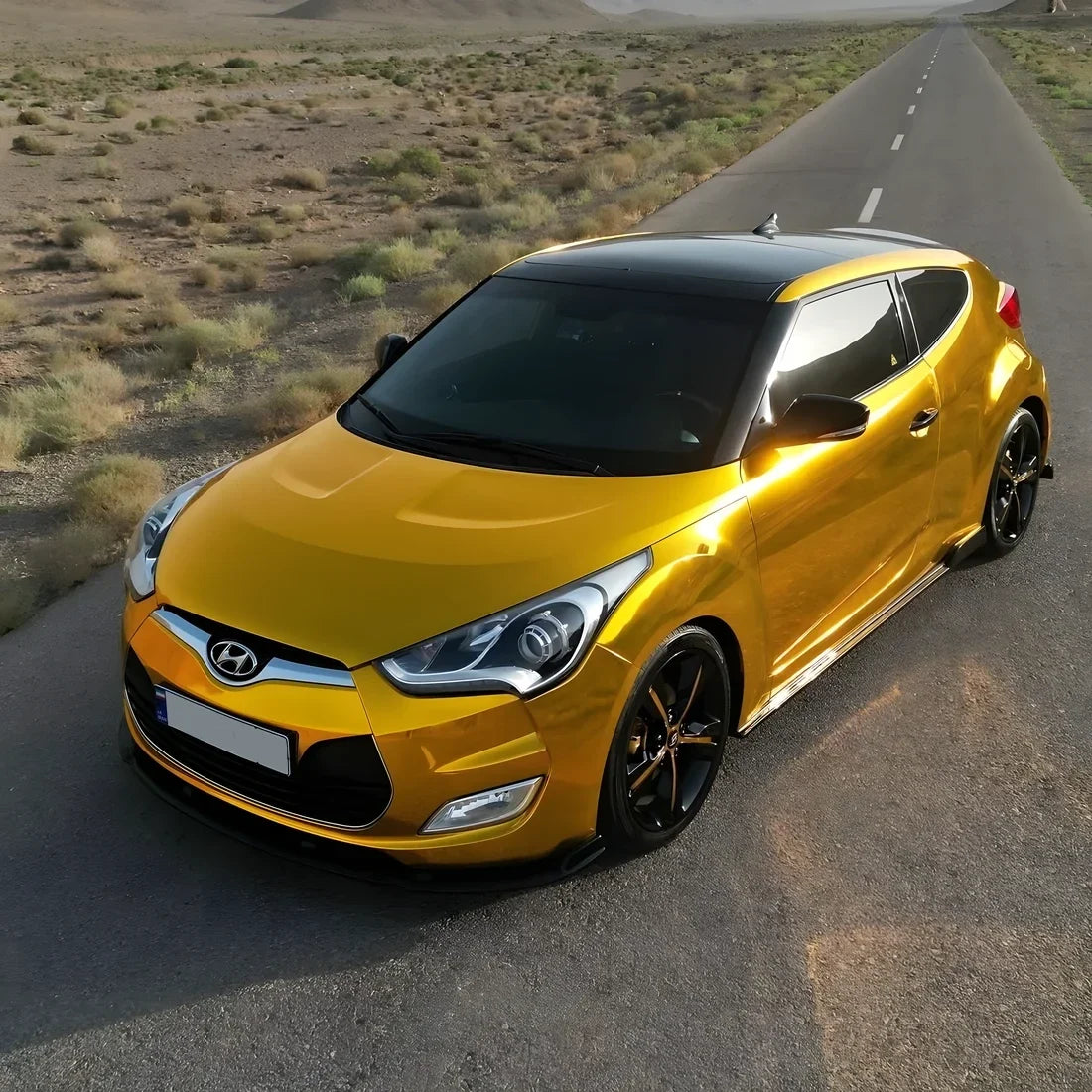 Yellow Gold Mirror Chromevinyl vinyl wrap on Hyundai with a bright metallic.