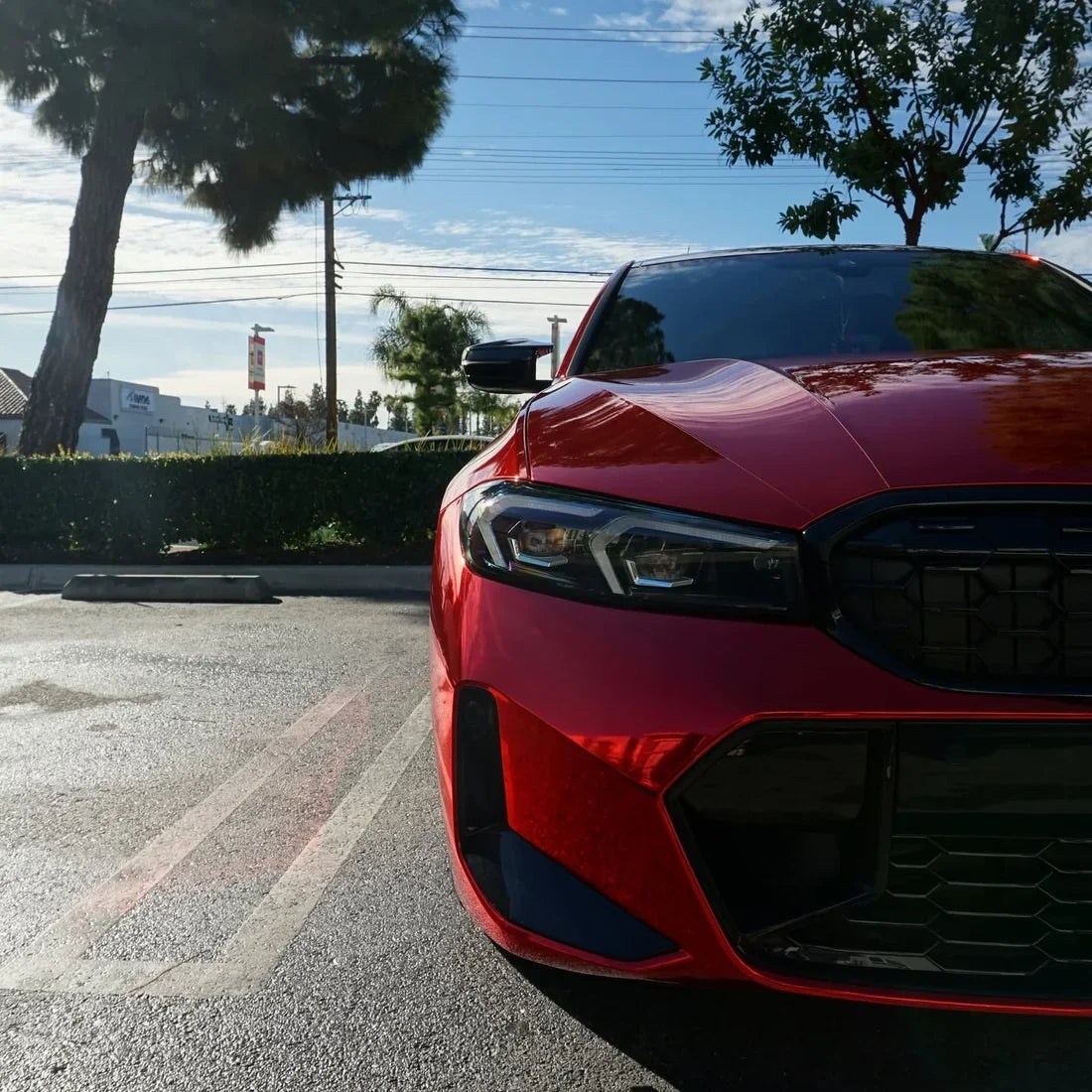 Cherry Red Mirror Chrome vinyl wrap BMW showing a bold reflective.