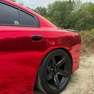 Cherry Red Mirror Chrome vinyl wrap Dodge with a glossy reflective exterior.