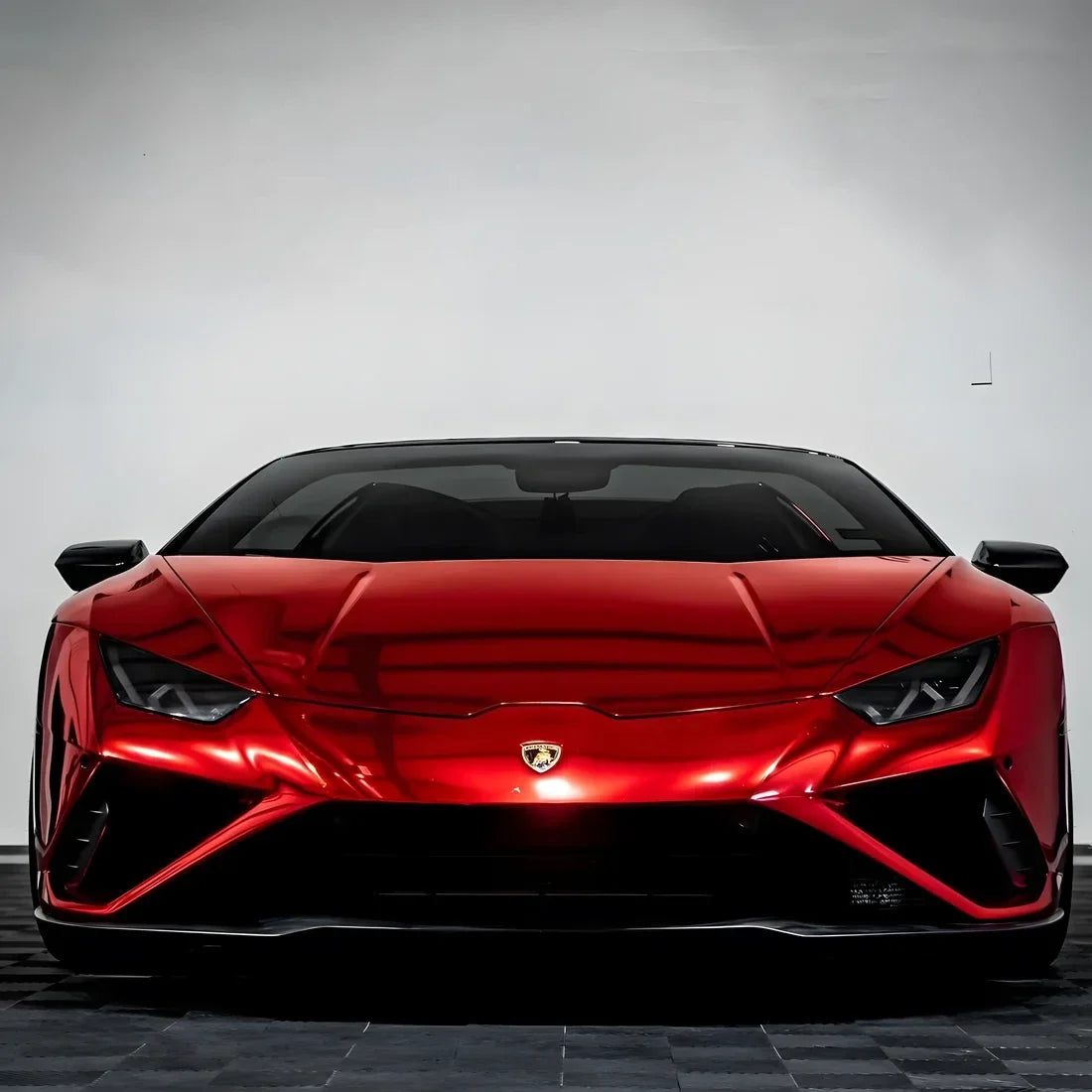 Lamborghini featuring a bold Cherry Red Mirror Chrome vinyl wrap.