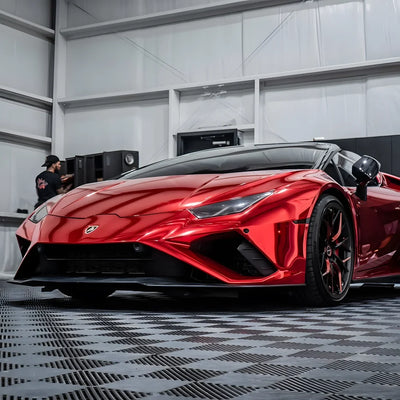 Cherry Red Mirror Chrome vinyl wrap Lamborghini with a vibrant reflective finish.