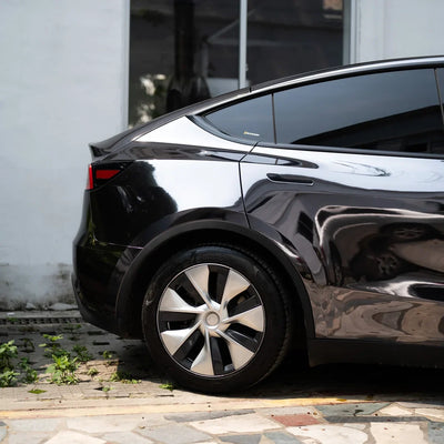 Tesla showing off its glossy Jet Black Mirror Chrome vinyl wrap.