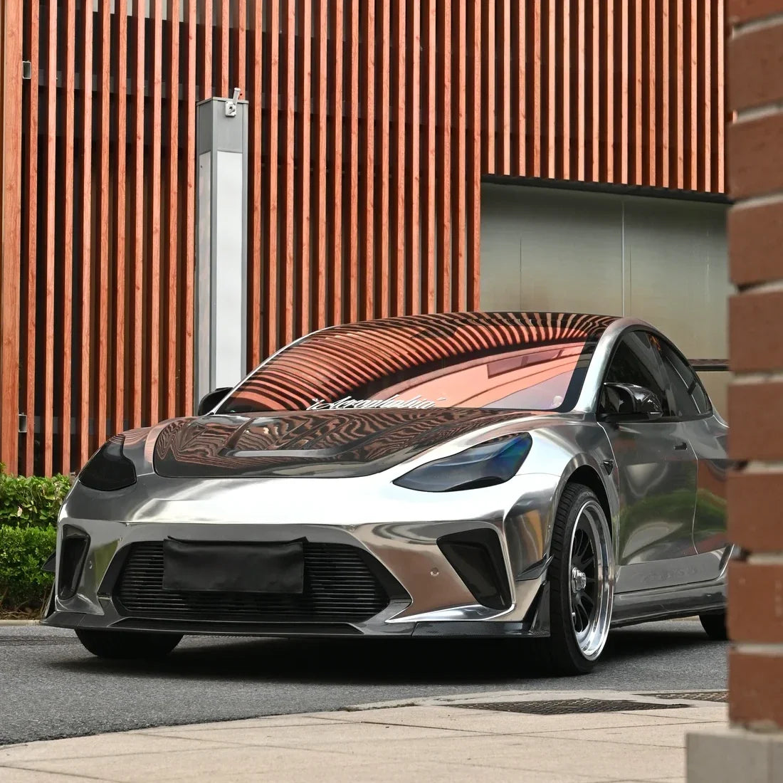 Jet Black Mirror Chrome vinyl wrap Tesla