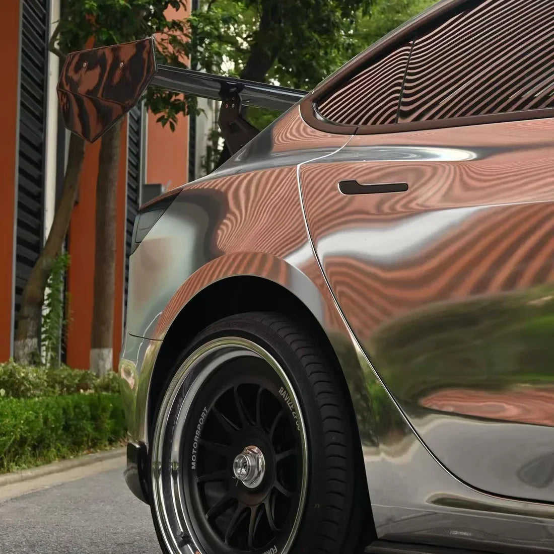 Jet Black Mirror Chrome vinyl wrap Tesla