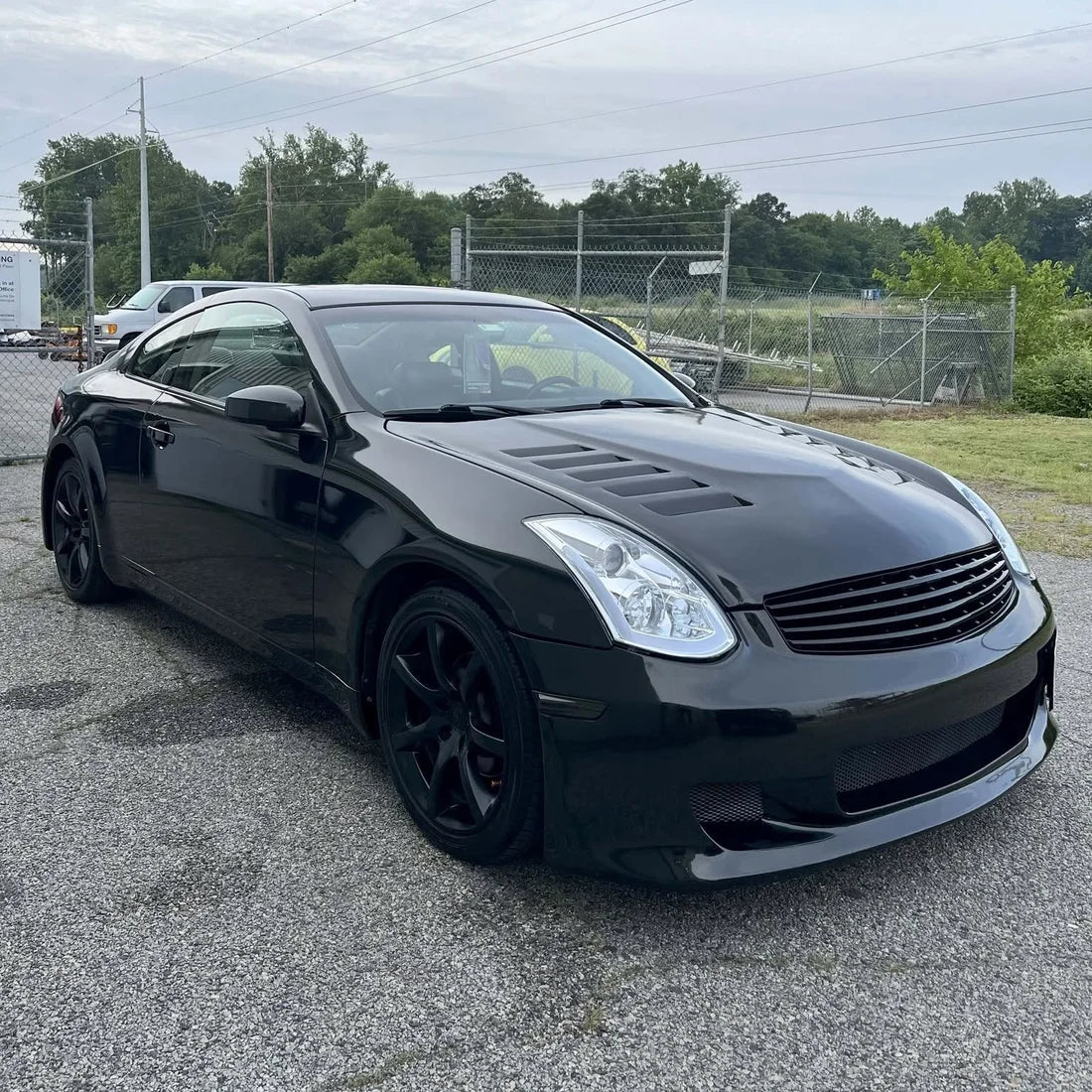 Gloss Metallic Ebony Sparkle Vinyl Wrap on a customized car.
