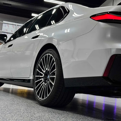 Gloss Color Shift Pearl White Vinyl Wrap on BMW side