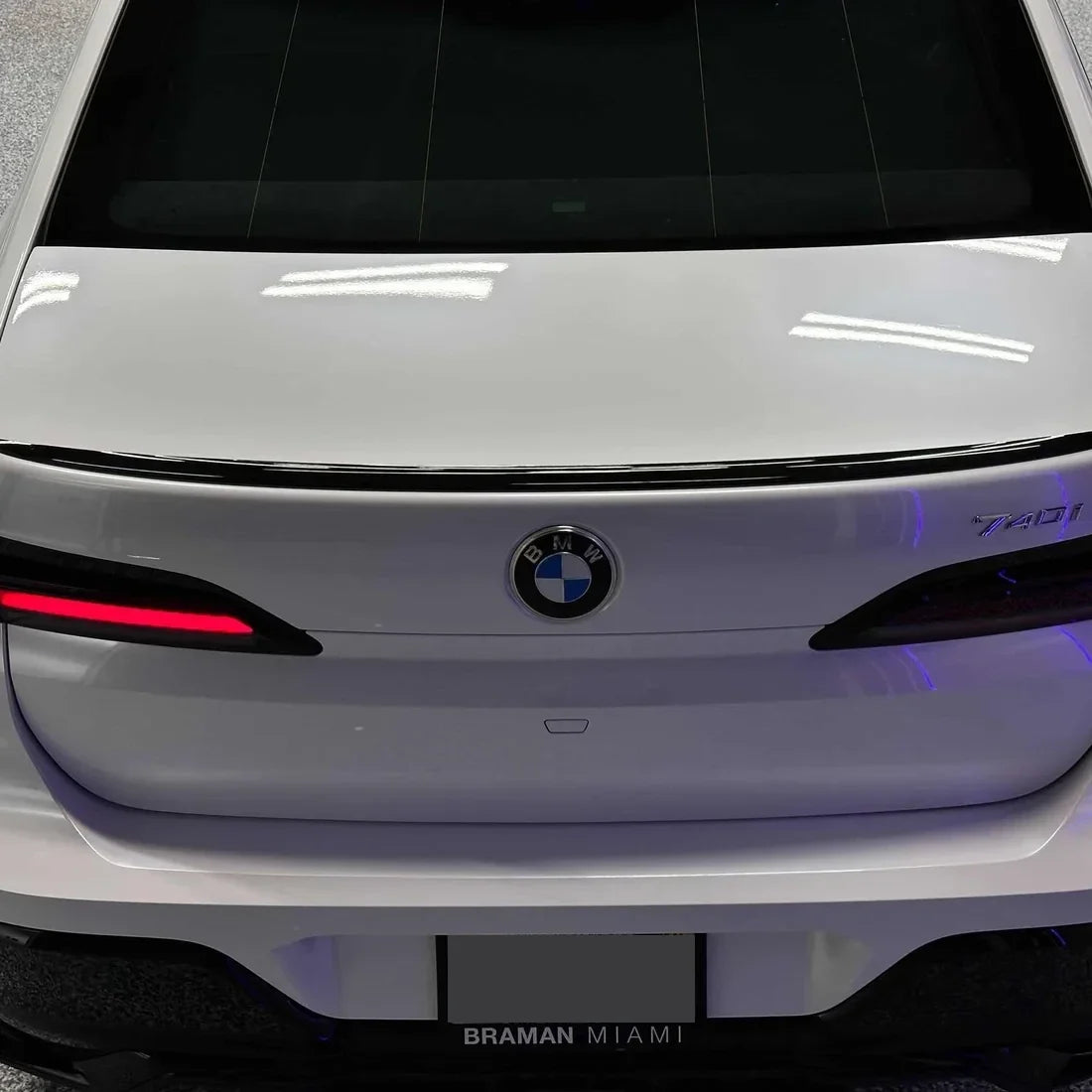 Gloss Color Shift Pearl White Vinyl Wrap on BMW rear