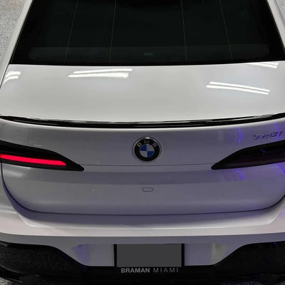 Gloss Color Shift Pearl White Vinyl Wrap on BMW rear