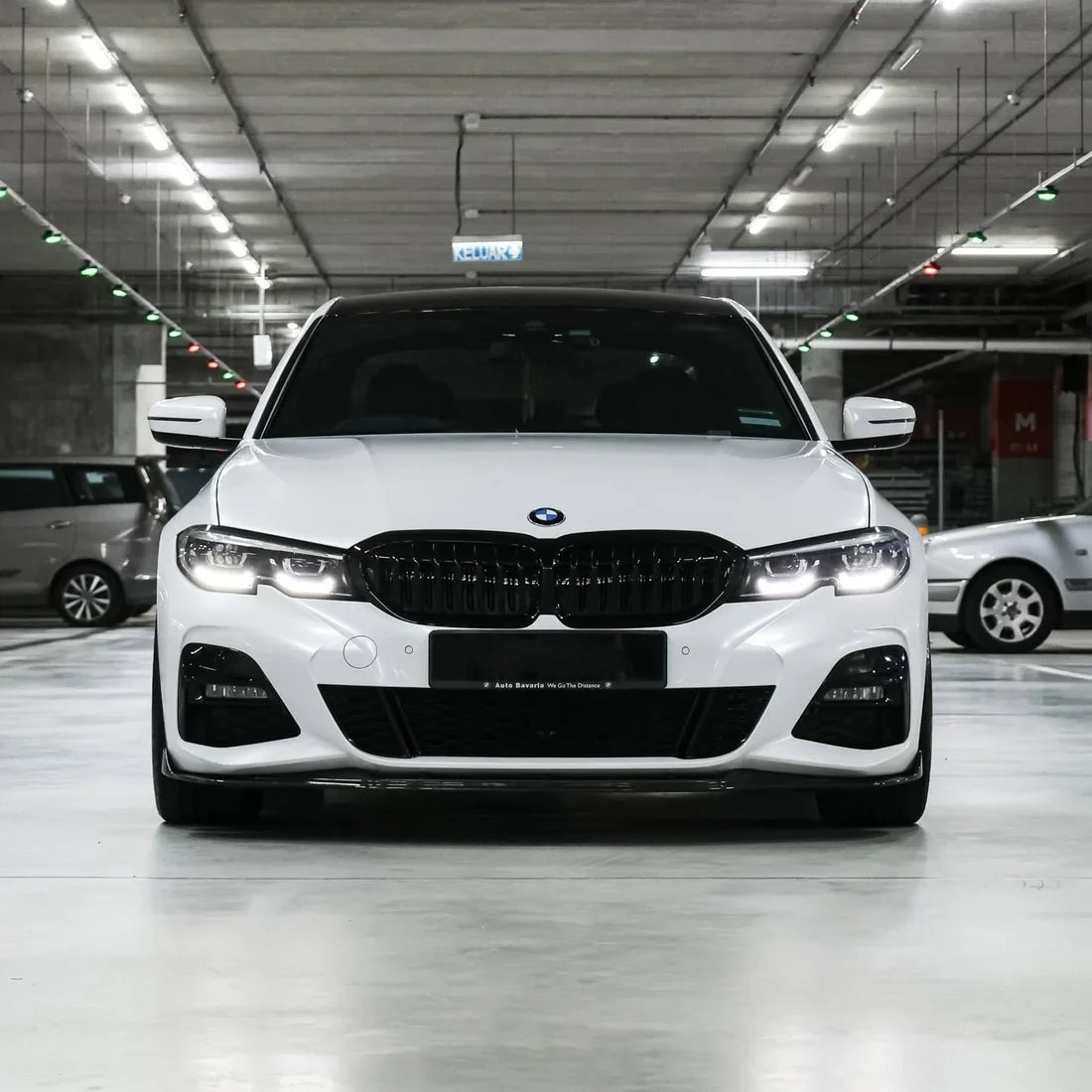 White Pearl Glitter Gloss vinyl wrap BMW 3 Series under parking side.