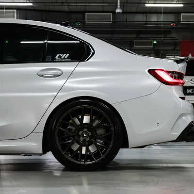 White Pearl Glitter Gloss vinyl wrap BMW 3 Series side view.