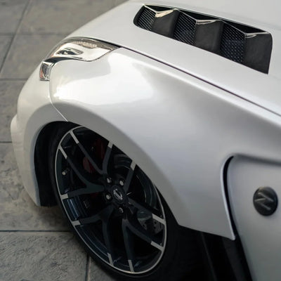 Pearl White Vinyl Wrap on Nissan wheel area