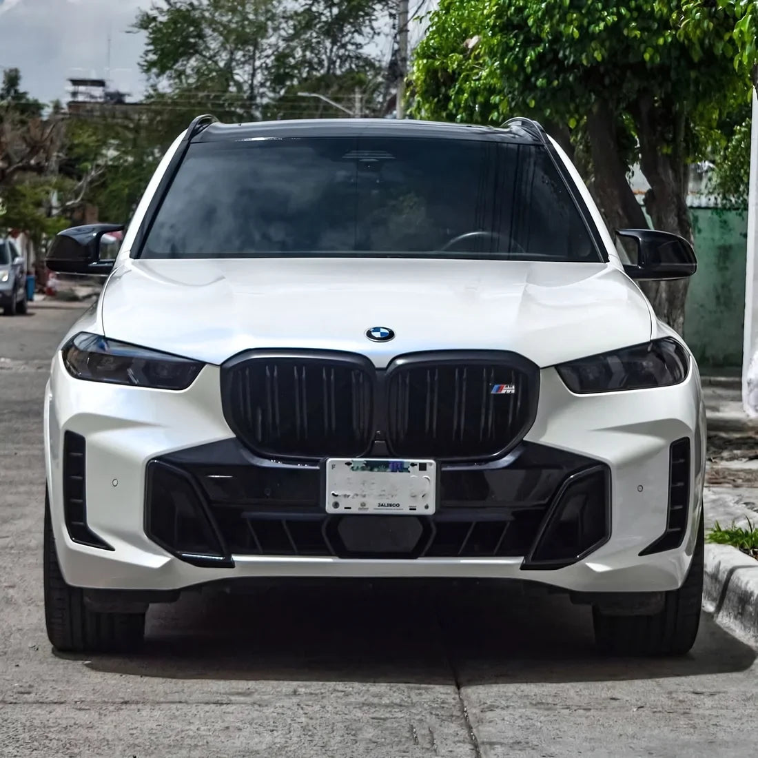 Gloss Light Blue Pearl Vinyl Wrap on BMW front