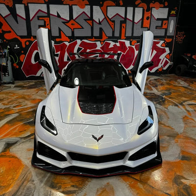 gold peral white chameleon wrap on beautiful car