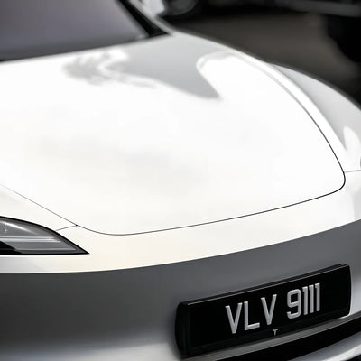 front look of tesla with the gold peral white chameleon wrap