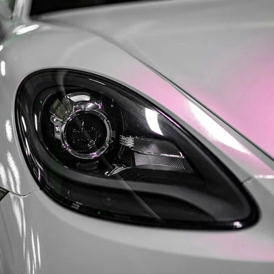 close up look of lavender pearl white chameleon vinyl wrap on porsche