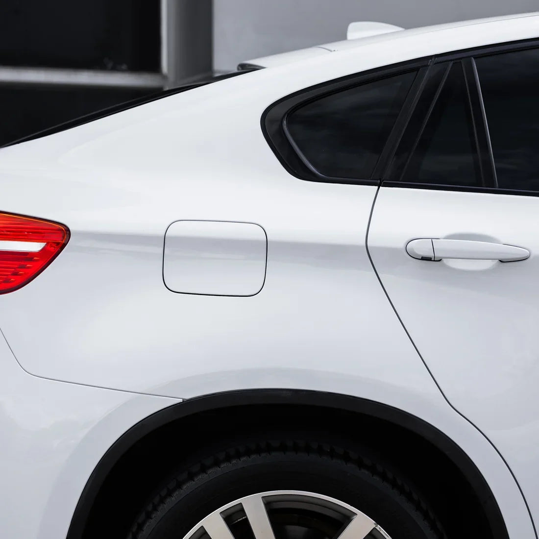 frosted pearl white chameleon vinyl wrap on car with side view