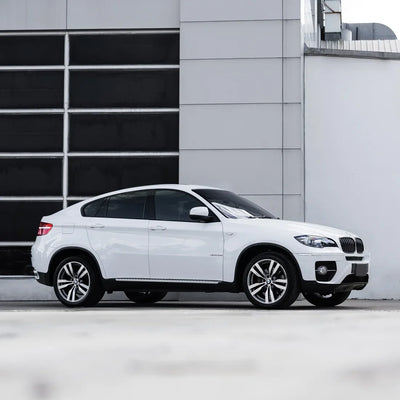 A frosted pearl white chameleon Vinyl wrap on BMW Tyre Side