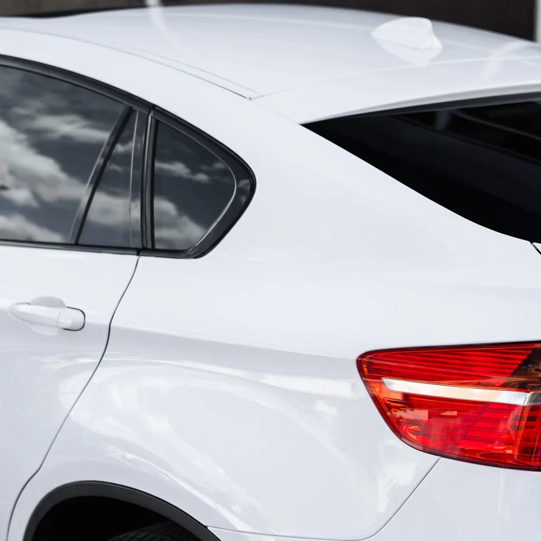 frosted pearl white chameleon vinyl wrap on car