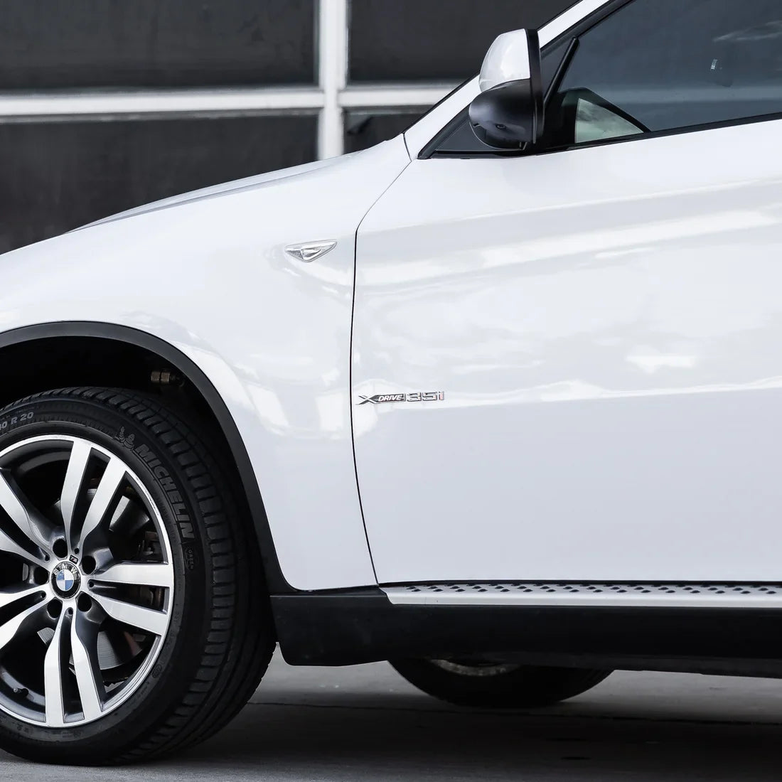 frosted pearl white chameleon vinyl wrap on bmw