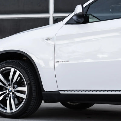 frosted pearl white chameleon vinyl wrap on bmw